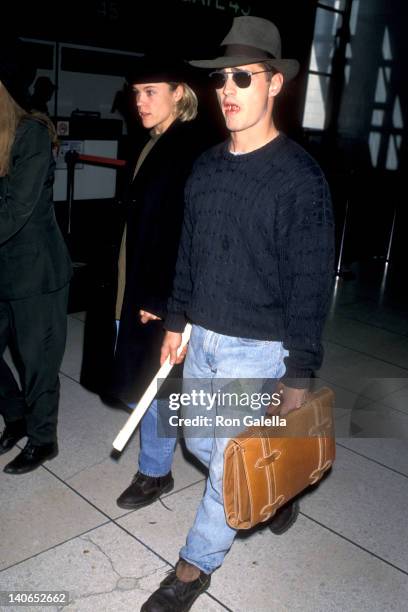 Jason Priestley and Christine Elise at the Jason Priestley and Christine Elise at Los Angeles International Airport, Los Angeles International...