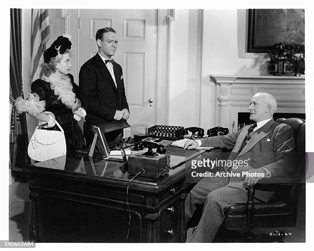 Ann Sothern and William Gargan finally get into the White House to meet the President Lewis Stone in a scene from the film 'Joe and Ethel Turp Call...