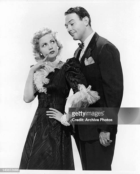 Ann Sothern has inquisitive look with William Gargan admiring in a scene from the film 'Joe and Ethel Turp Call on the President', 1939.