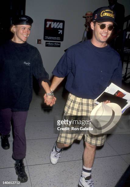 Jason Priestley and Christine Elise at the Jason Priestley and Christine Elise at Los Angeles International Airport, Los Angeles International...