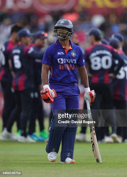 Rahul Tripathi of India walks off the pitch after being caught during the T20 Tour match between Northamptonshire and India at The County Ground on...