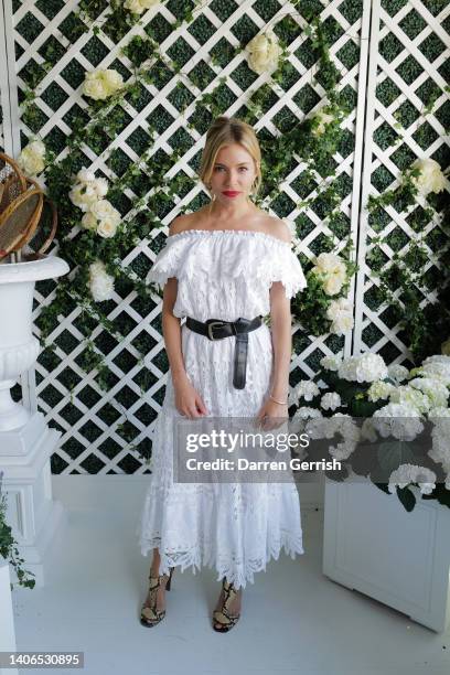 Sienna Miller, wearing Ralph Lauren, attends the Polo Ralph Lauren & British Vogue event during The Championships, Wimbledon at All England Lawn...