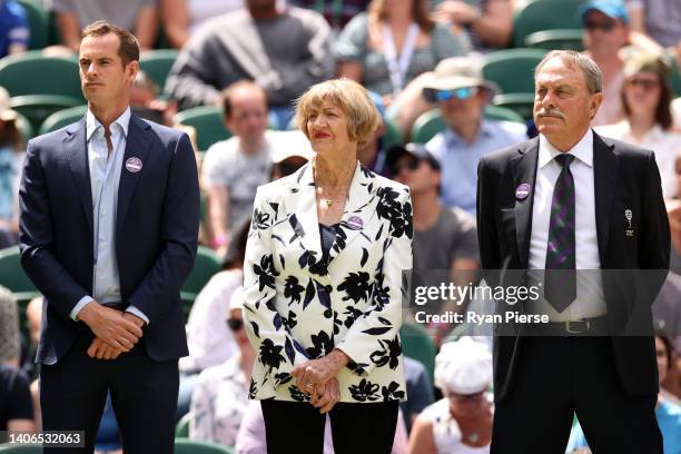 Former Wimbledon Champions, Andy Murray, Margaret Court and John Newcombe look on during the Centre Court Centenary Ceremony on day seven of The...