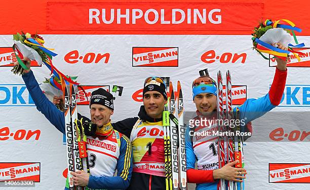Carl Johan Bergman of Sweden , Martin Fourcade of France and Anton Shipulin of Russia celebrate their medals after the Men's 12,5km Pursuit during...
