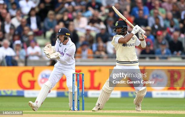 Cheteshwar Pujara of India bats watched by England wicketkeeper Sam Billings during day three of Fifth LV= Insurance Test Match between England and...