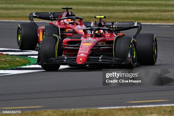 Carlos Sainz of Spain driving the Ferrari F1-75 leads Charles Leclerc of Monaco driving the Ferrari F1-75 during the F1 Grand Prix of Great Britain...