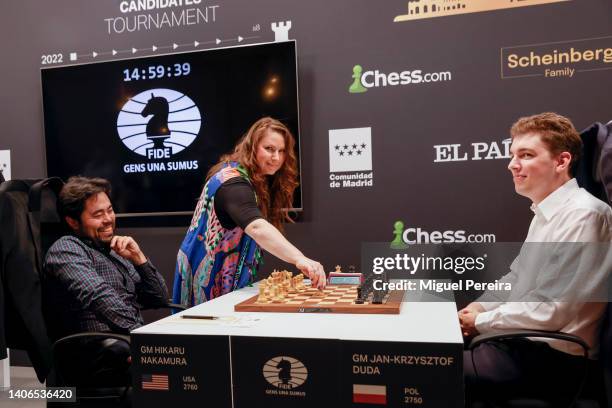 Judit Polgár, a Hungarian chess grandmaster generally considered the strongest female chess player of all time, makes the first move of the game...