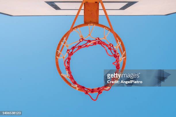 basketball ring from the floor - financial target stock-fotos und bilder