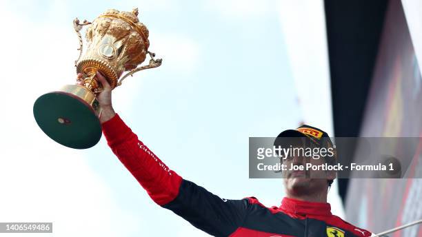 Race winner Carlos Sainz of Spain and Ferrari celebrates on the podium during the F1 Grand Prix of Great Britain at Silverstone on July 03, 2022 in...