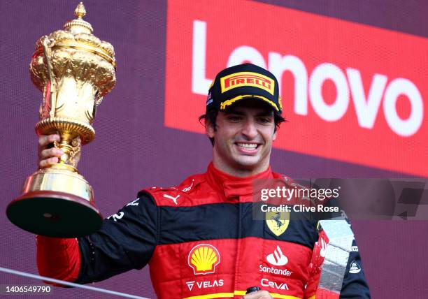 Race winner Carlos Sainz of Spain and Ferrari celebrates on the podium during the F1 Grand Prix of Great Britain at Silverstone on July 03, 2022 in...