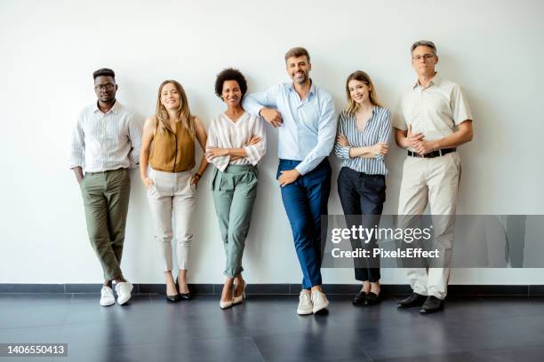 el éxito es simplemente en lo que somos buenos - business group portrait fotografías e imágenes de stock