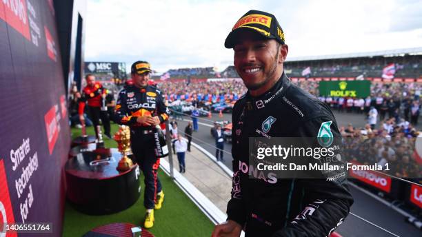 Third placed Lewis Hamilton of Great Britain and Mercedes celebrates on the podium during the F1 Grand Prix of Great Britain at Silverstone on July...