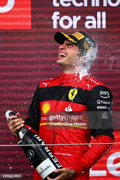 Race winner Carlos Sainz of Spain and Ferrari celebrates on the podium during the F1 Grand Prix of Great Britain at Silverstone on July 03, 2022 in...