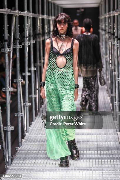 Model walks the runway during the Paco Rabanne Spring Summer 2023 show as part of Paris Fashion Week at Palais De Tokyo on July 03, 2022 in Paris,...