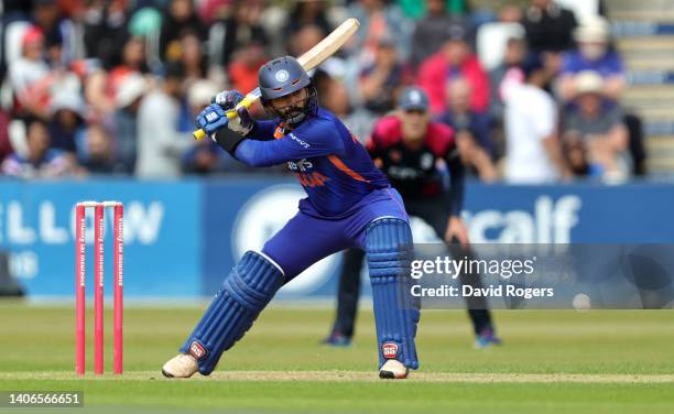 Dinesh Karthik of India hits the ball to the boundary during the T20 Tour match between Northamptonshire and India at The County Ground on July 03,...