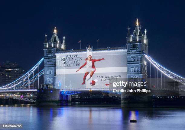 In this image released on July 3, Nike celebrate the footballing brilliance of Leah Williamson by lighting up London landmark Tower Bridge ahead of...