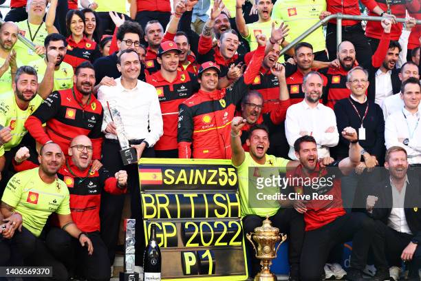 Race winner Carlos Sainz of Spain and Ferrari celebrates with his team after the F1 Grand Prix of Great Britain at Silverstone on July 03, 2022 in...