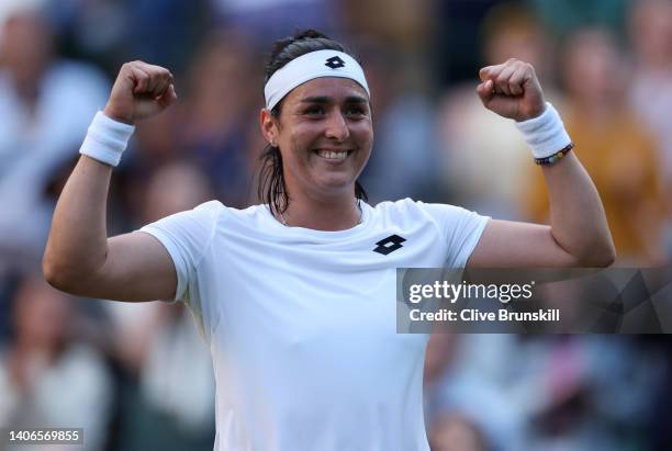 Ons Jabeur of Tunisia celebrates winning against Elise Mertens of Belgium during their Women's Singles Fourth Round match on day seven of The...