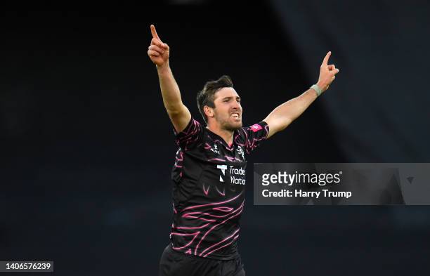 Craig Overton of Somerset celebrates the wicket of Jamie Overton of Surrey during the Vitality T20 Blast match between Somerset and Surrey at The...