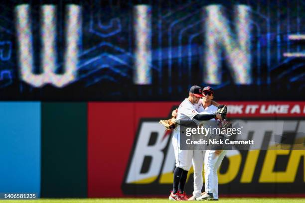 Ernie Clement, Myles Straw and Steven Kwan of the Cleveland Guardians celebrate the teams 2-0 win over the New York Yankees at Progressive Field on...