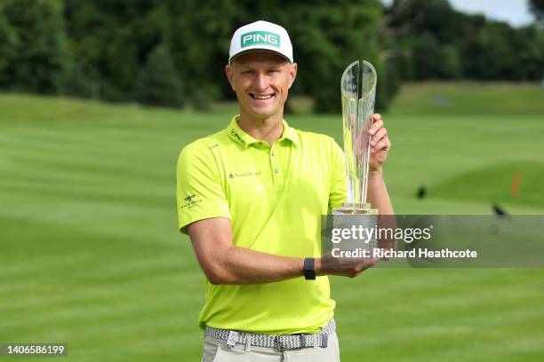 Adrian Meronk of Poland poses with the trophy after securing victory during Day Four of the Horizon Irish Open at Mount Juliet Estate on July 03,...