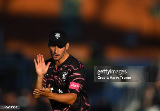 Lewis Gregory of Somerset looks on during the Vitality T20 Blast match between Somerset and Surrey at The Cooper Associates County Ground on July 03,...