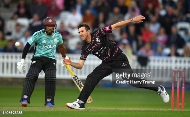 Craig Overton of Somerset gathers the ball during the Vitality T20 Blast match between Somerset and Surrey at The Cooper Associates County Ground on...