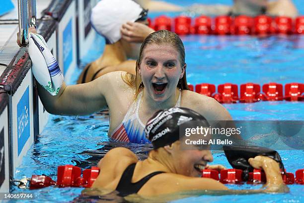 Rebecca Adlington of Nova Centurion celebrates winning the gold medal with Joanne Jackson of Loughborough University in the Womens Open 400m...