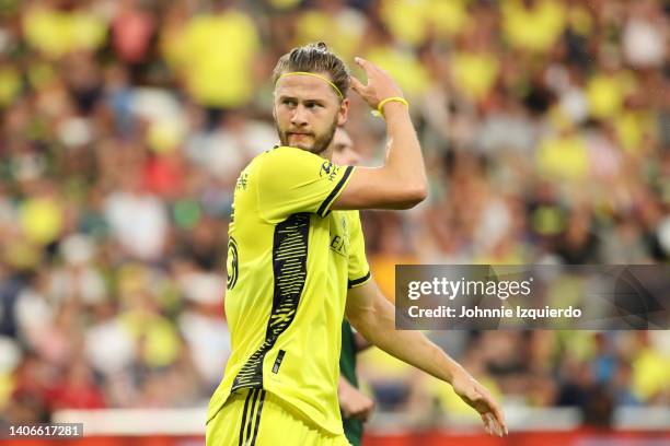 Walker Zimmerman of Nashville SC cheers during the game against the Portland Timbers at GEODIS Park on July 03, 2022 in Nashville, Tennessee.