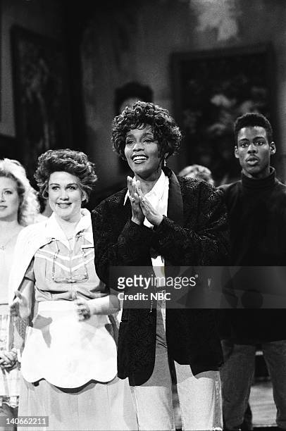 Episode 14 -- Pictured: Victoria Jackson, Julia Sweeney, Whitney Houston, Chris Rock during the closing on February 23, 1991 -- Photo by: Raymond...