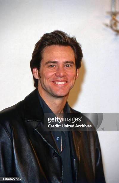 Jim Carey, amerikanischer Schauspieler, bei der Deutschlandpremiere des Films 'Der Grinch', Deutschland 1997.