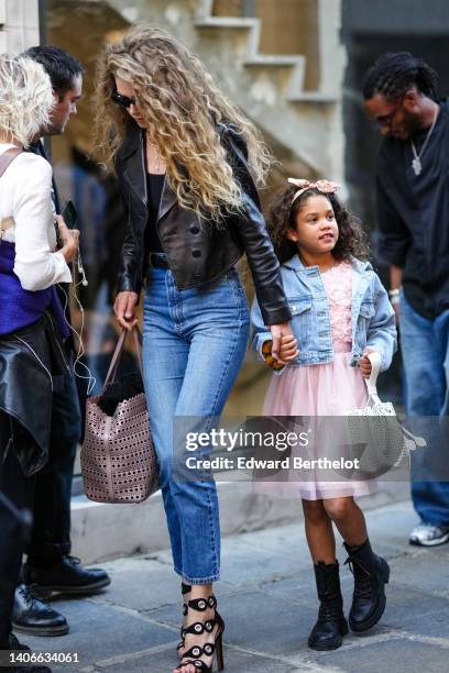 Doutzen Kroes is seen, outside the Alaia show, during Paris Fashion Week, on July 03, 2022 in Paris, France.