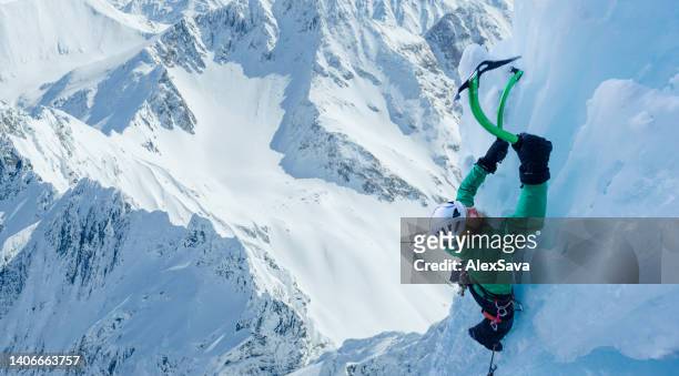 strong mountaineer - ice pick stockfoto's en -beelden