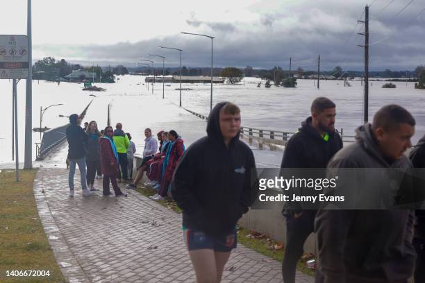 People view the flooded Windsor Bridge along the Hawkesbury River in the suburb of Windsor, on July 04, 2022 in Sydney, Australia. Thousands of...
