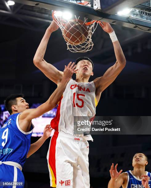 Zhou Qi of China dunks the ball during the FIBA World Cup Asian Qualifier match between China and Chinese Taipei at John Cain Arena on July 04, 2022...