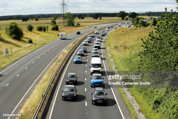 Protesters slow the traffic down on the A64 on July 04, 2022 in York, England. Prices for petrol and diesel have risen steadily this year as the...