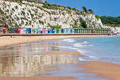 The sandy beach at Stone Bay with chalk cliffs in the seaside town of Broadstairs, east Kent, England