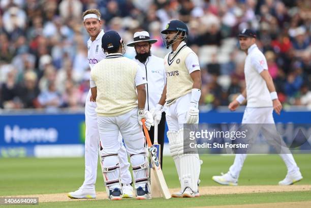 India batsman Rishabh Pant shares a joke with England bowler Stuart Broad during day four of the Fifth test match between England and India at...