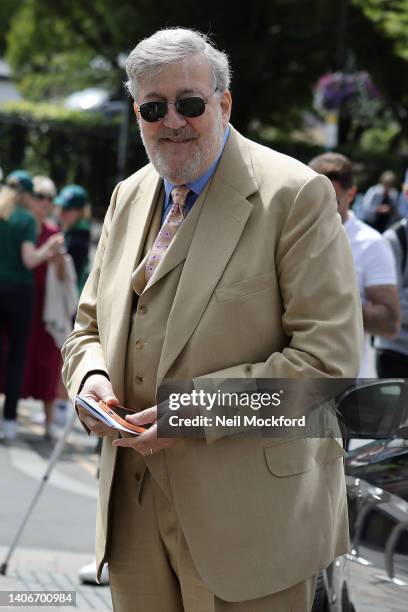 Stephen Fry arrives for Wimbledon 2022 Day 8 at All England Lawn Tennis and Croquet Club on July 04, 2022 in London, England.