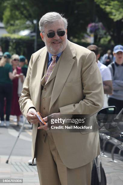 Stephen Fry arrives for Wimbledon 2022 Day 8 at All England Lawn Tennis and Croquet Club on July 04, 2022 in London, England.