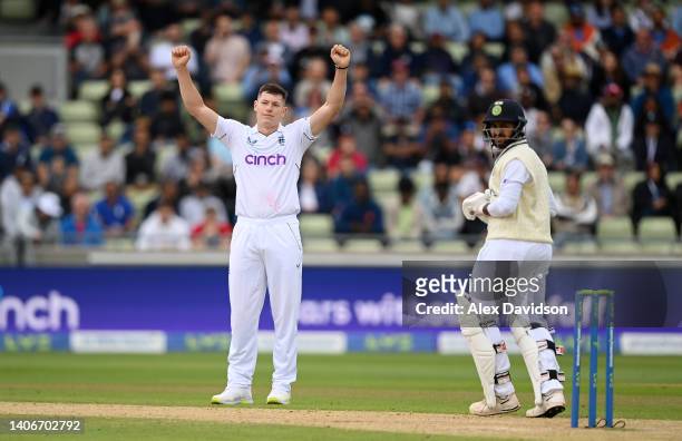 Matthew Potts of England celebrates taking the wicket of Shardul Thakur of India during Day Four of the Fifth Lv=Insurance Test Match at Edgbaston on...