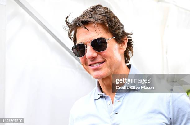 Actor Tom Cruise walks in the Paddock prior to the F1 Grand Prix of Great Britain at Silverstone on July 03, 2022 in Northampton, England.