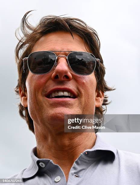 Actor Tom Cruise walks in the Paddock prior to the F1 Grand Prix of Great Britain at Silverstone on July 03, 2022 in Northampton, England.