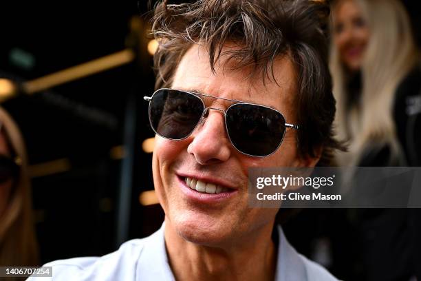 Actor Tom Cruise walks in the Paddock prior to the F1 Grand Prix of Great Britain at Silverstone on July 03, 2022 in Northampton, England.