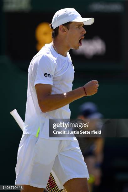 Alex de Minaur of Australia celebrates winning the second set against Cristian Garin of Chile during their Men's Singles Fourth Round match on day...