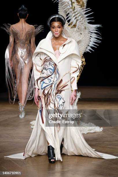 Model walks the runway during the Iris Van Herpen Haute Couture Fall Winter 2022 2023 show as part of Paris Fashion Week on July 4, 2022 in Paris,...