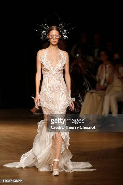 Model walks the runway during the Iris Van Herpen Haute Couture Fall Winter 2022 2023 show as part of Paris Fashion Week on July 04, 2022 in Paris,...