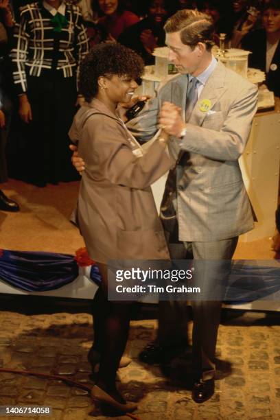 Prince Charles dances with an unidentified woman during his 40th birthday party. The party took place during the launch of his Princes Youth Business...