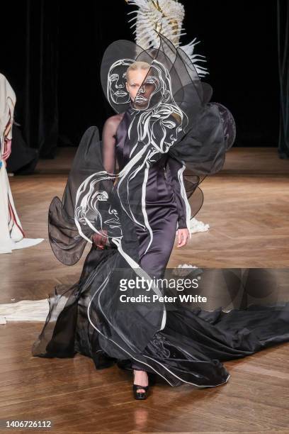 Model walks the runway during the Iris Van Herpen Haute Couture Fall Winter 2022 2023 show as part of Paris Fashion Week on July 04, 2022 in Paris,...