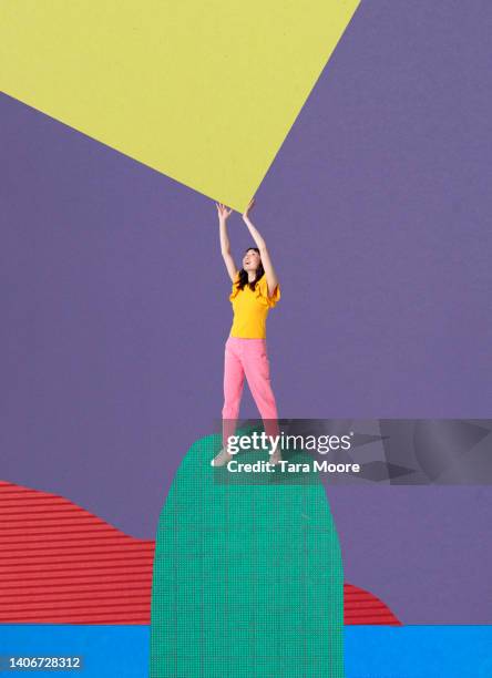 woman reaching up - paper art stock pictures, royalty-free photos & images
